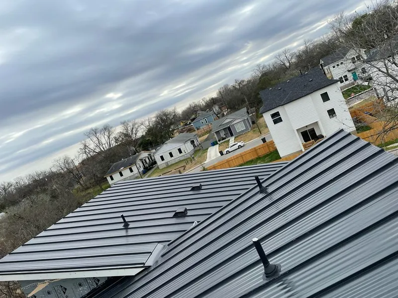 Standing seam metal roof panels with vents for Skylight Repair in Colby